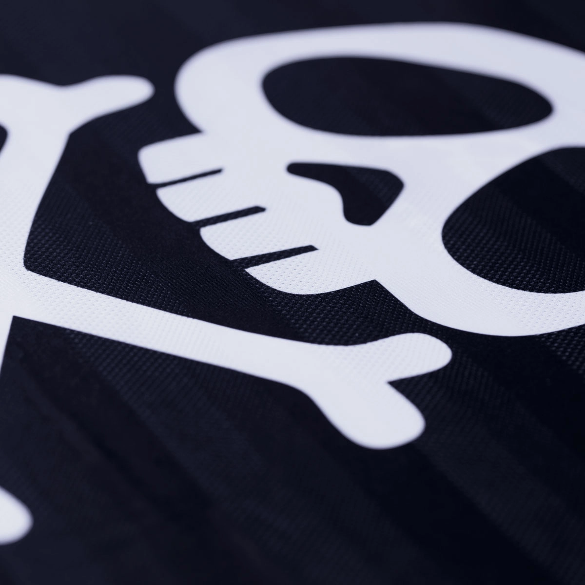 Detail of the breathable honeycomb fabric of the MATNAK Jon Salat Muay Thai t-shirt